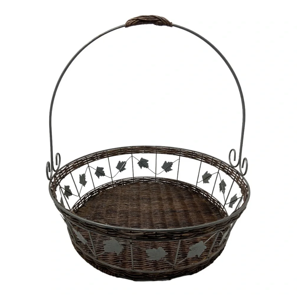Rattan/Wicker Metal Brown Basket with Leaf Embellishment.
